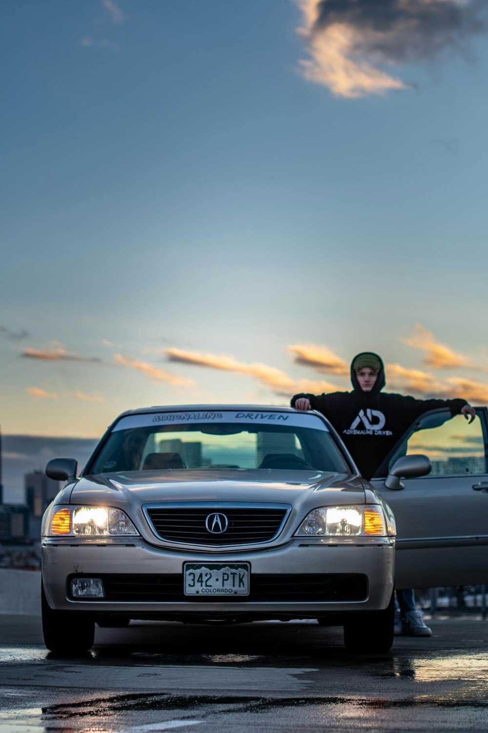 black chevrolet car on road during sunset