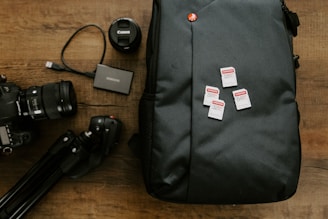 black laptop bag on brown wooden table