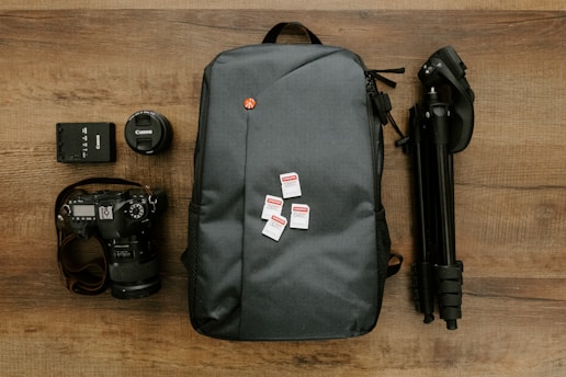 black and white nike backpack on brown wooden table