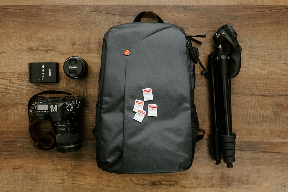 black and white nike backpack on brown wooden table