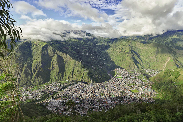 Baños de Agua Santa nestled in a deep green Andean valley