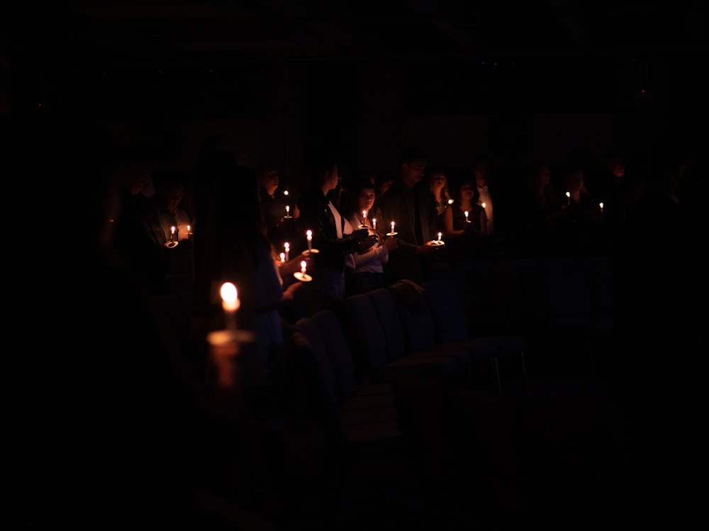 people sitting on chairs during night time