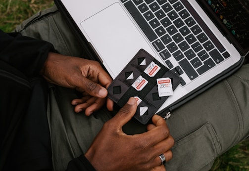 person holding black and white card