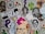 A collage of stickers featuring various graphic designs, including skulls, skeletons, a green hand with an eyeball, a dancing figure with a rose head, and other random whimsical and gothic artwork. One sticker prominently reads 'Planet of the Dead'.