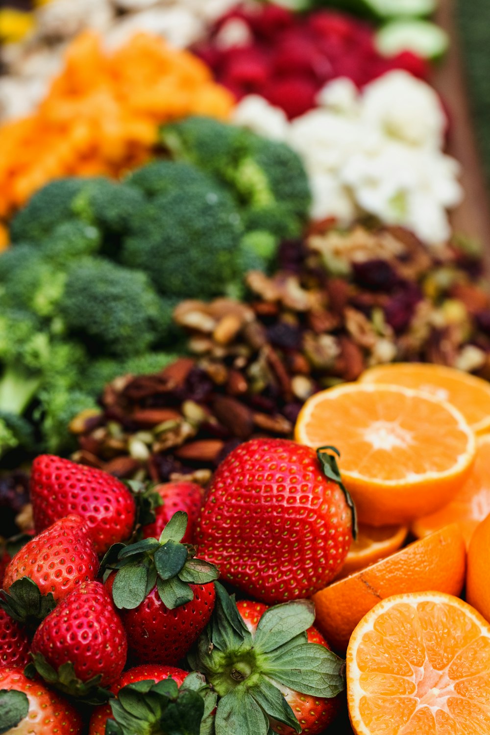 sliced orange fruit and green broccoli