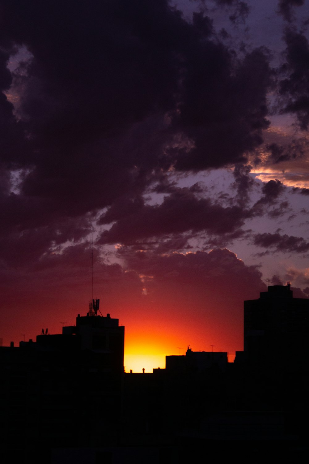 silhouette of building during sunset