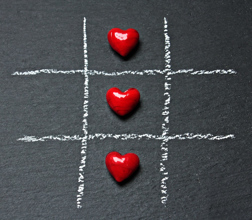 red heart shaped decors on gray textile