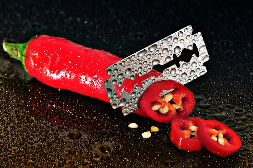 red and white candy on black textile