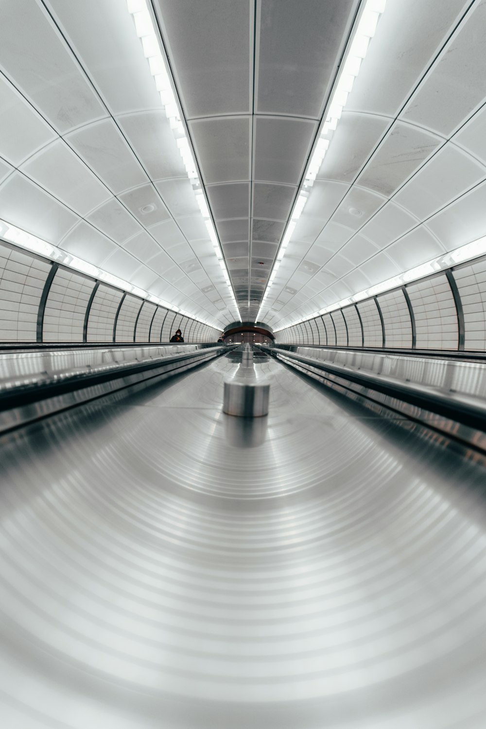 black and white tunnel with white ceiling