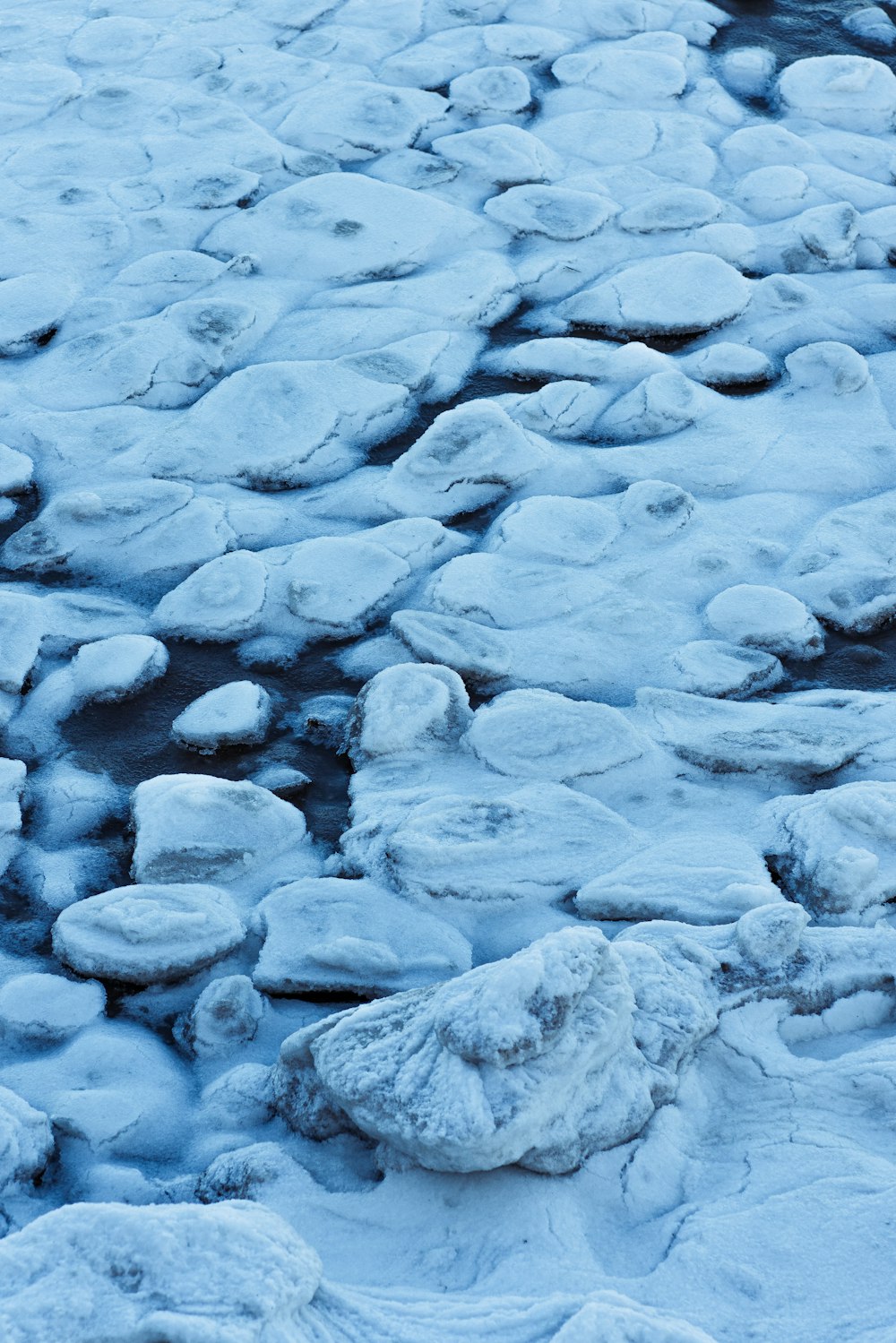 gray and white stones on water