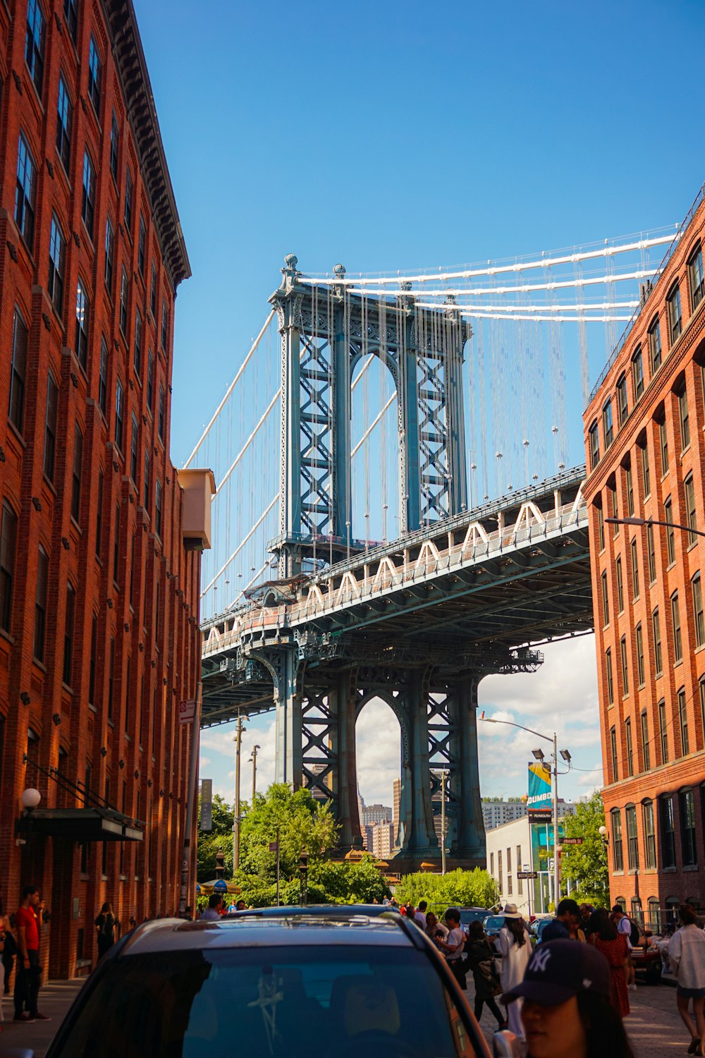 gray bridge under blue sky during daytime