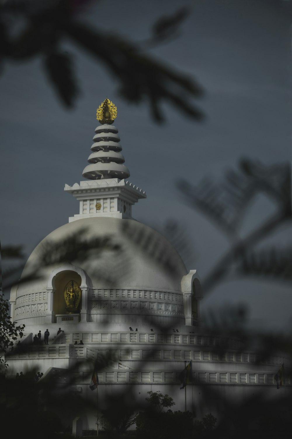 white and gold temple under blue sky