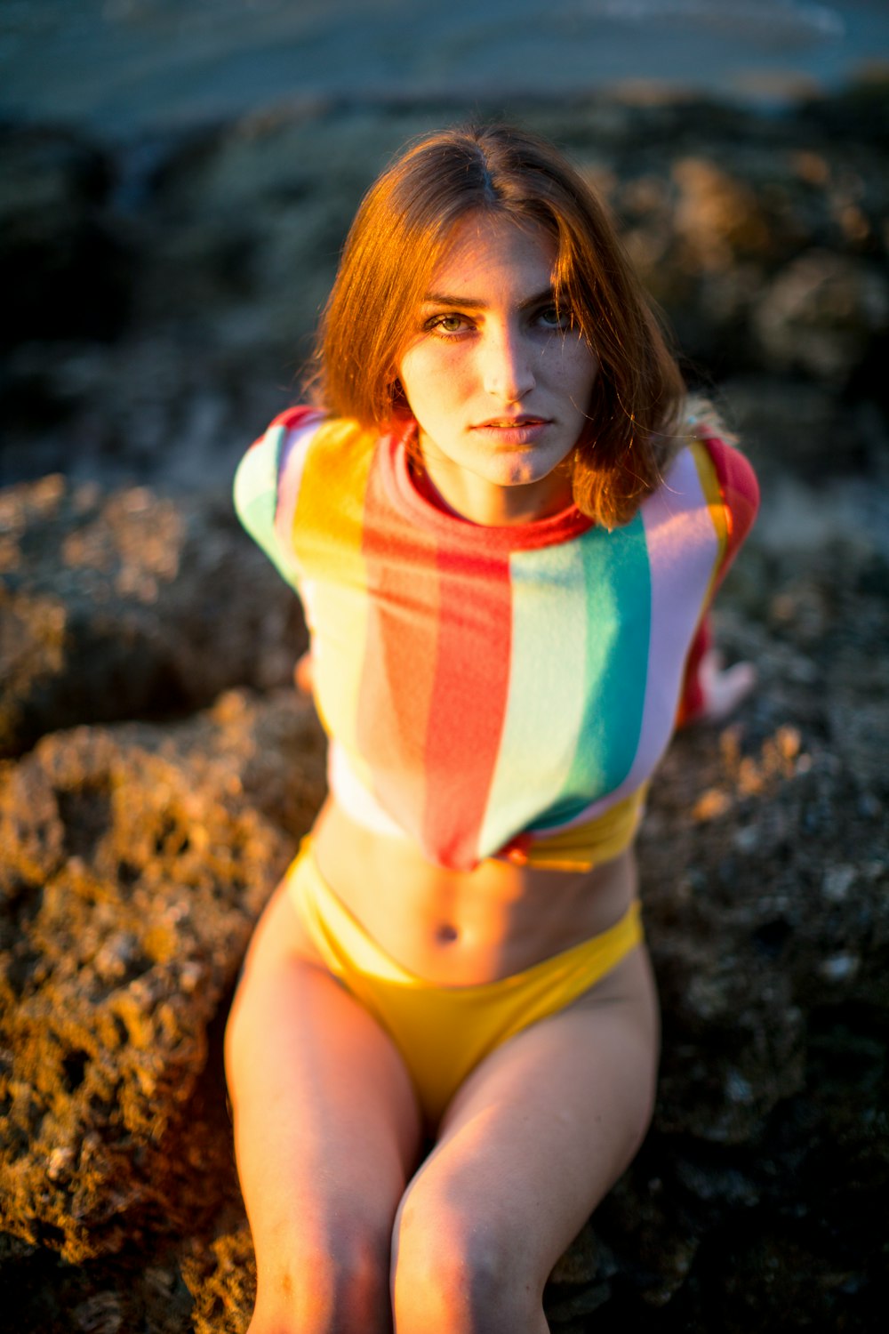 woman in white red and blue striped shirt and yellow panty