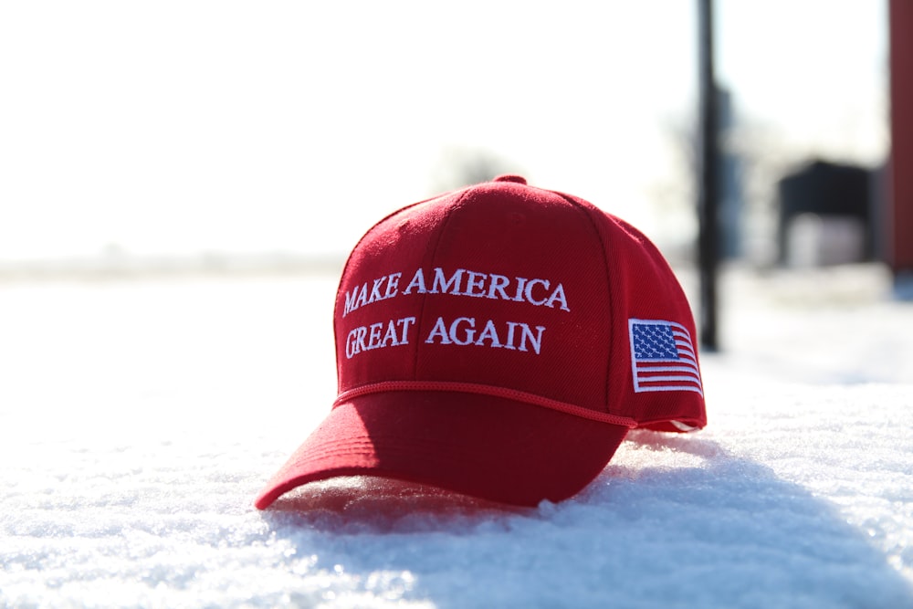 a red hat that says make america great again