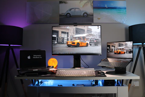 black laptop computer on white desk