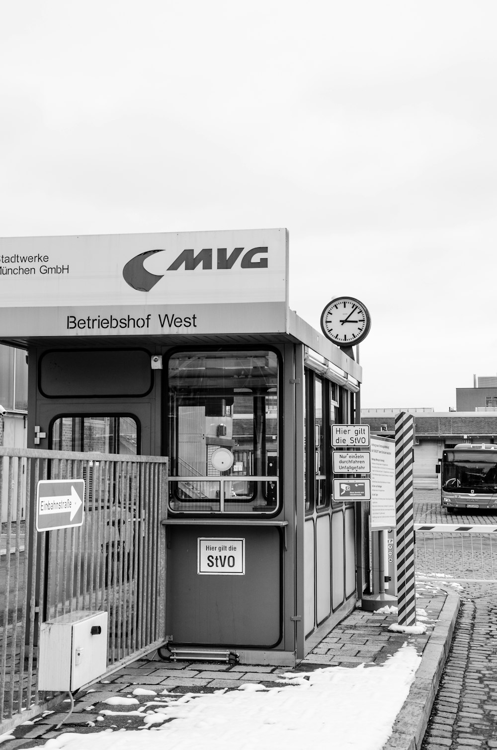 a black and white photo of a train station