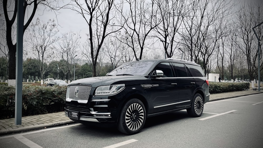 black audi suv on road