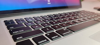 A close-up of a laptop screen displaying a detailed comparison chart of different models.