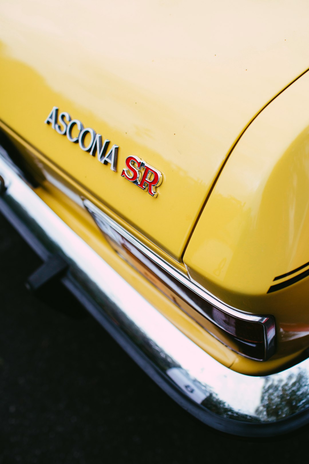 yellow and silver vintage car