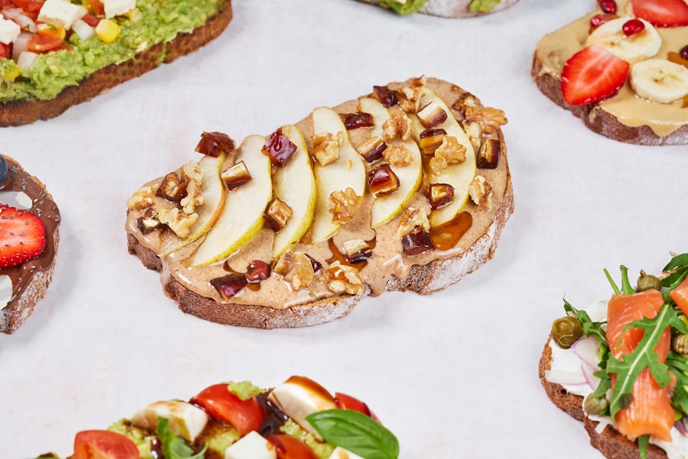 brown bread with white cream and green vegetable