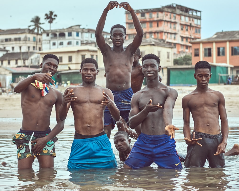 group of men in blue shorts