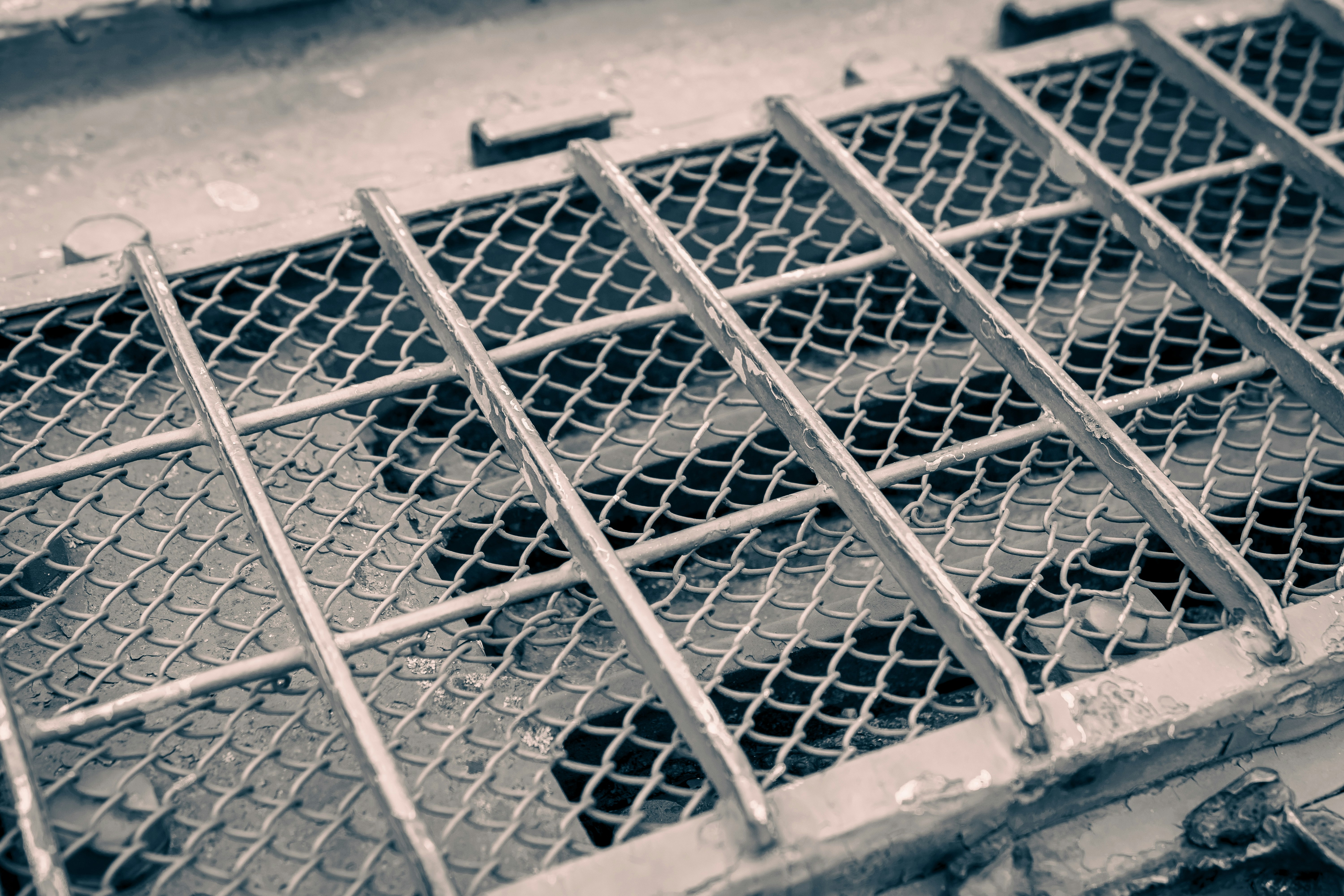 grey metal screen on grey concrete floor