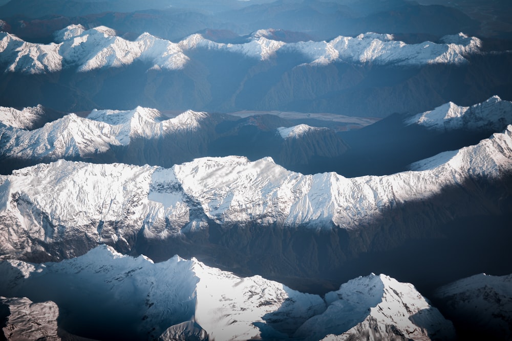 snow covered mountain during daytime