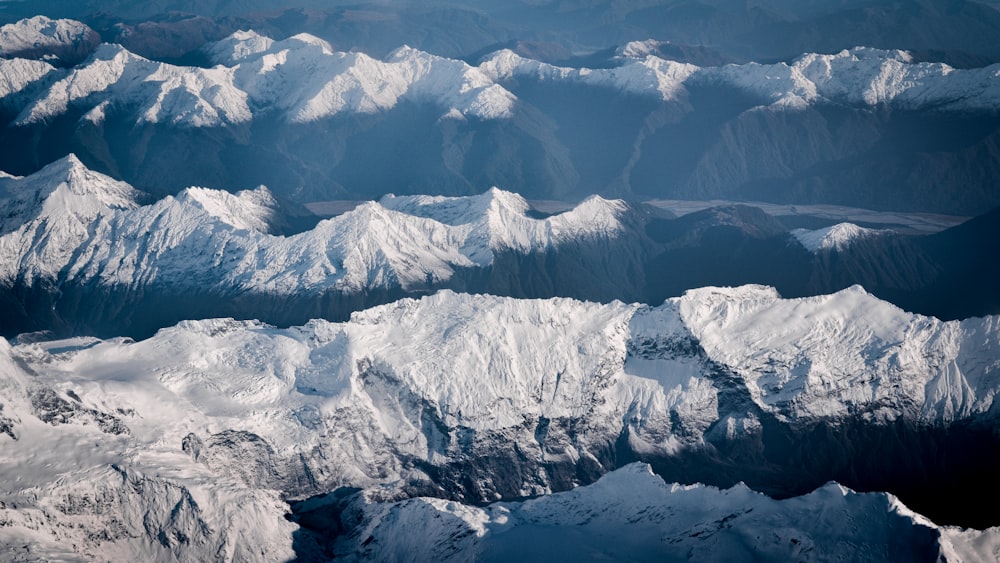 snow covered mountain during daytime