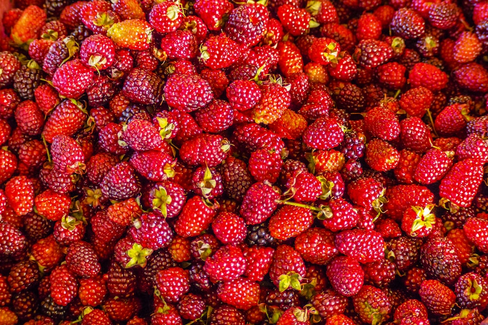 red strawberries on white ceramic plate