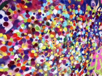 Zoomed view of a colorful anime-inspired digital print with intricate dots.