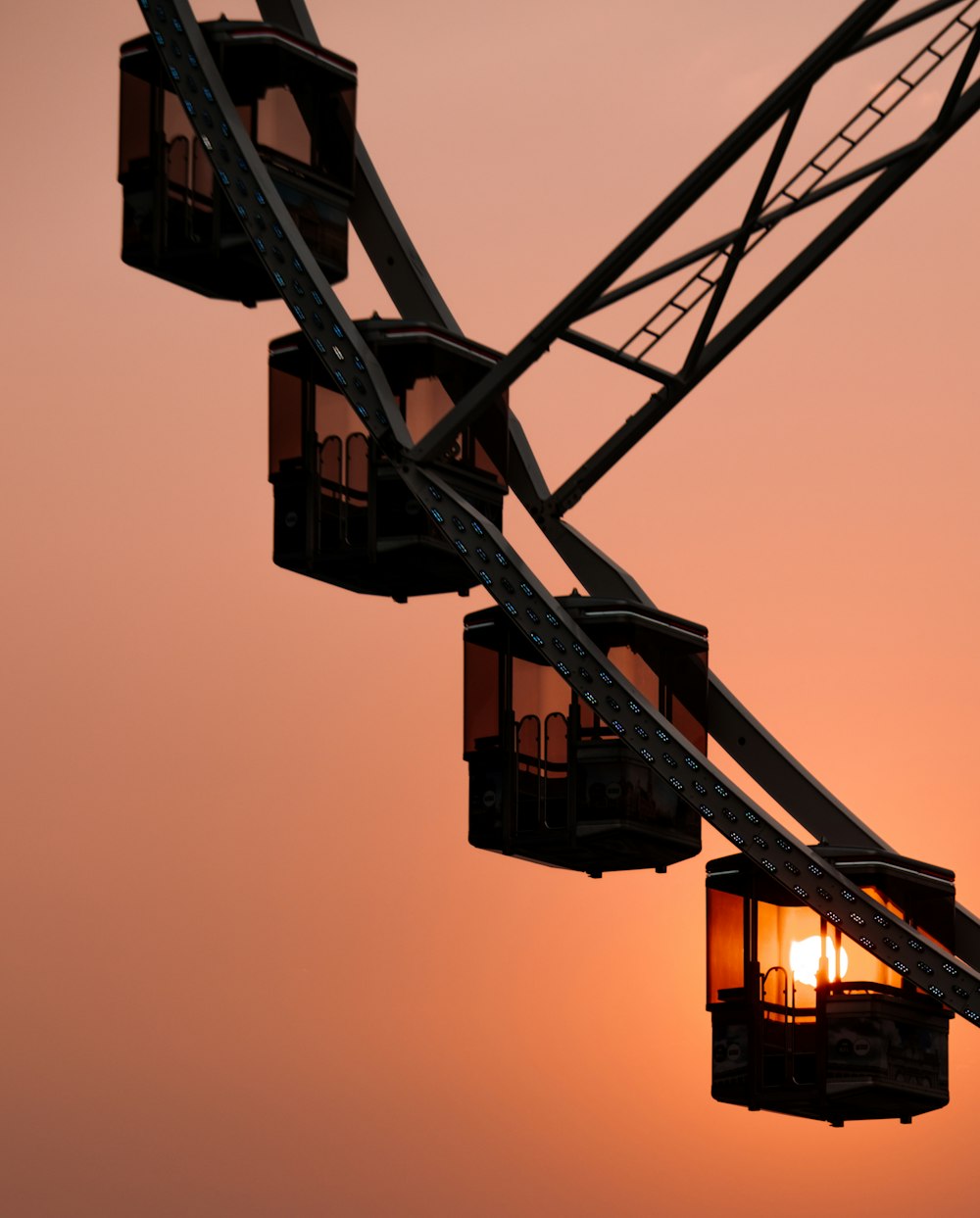 black metal crane during sunset