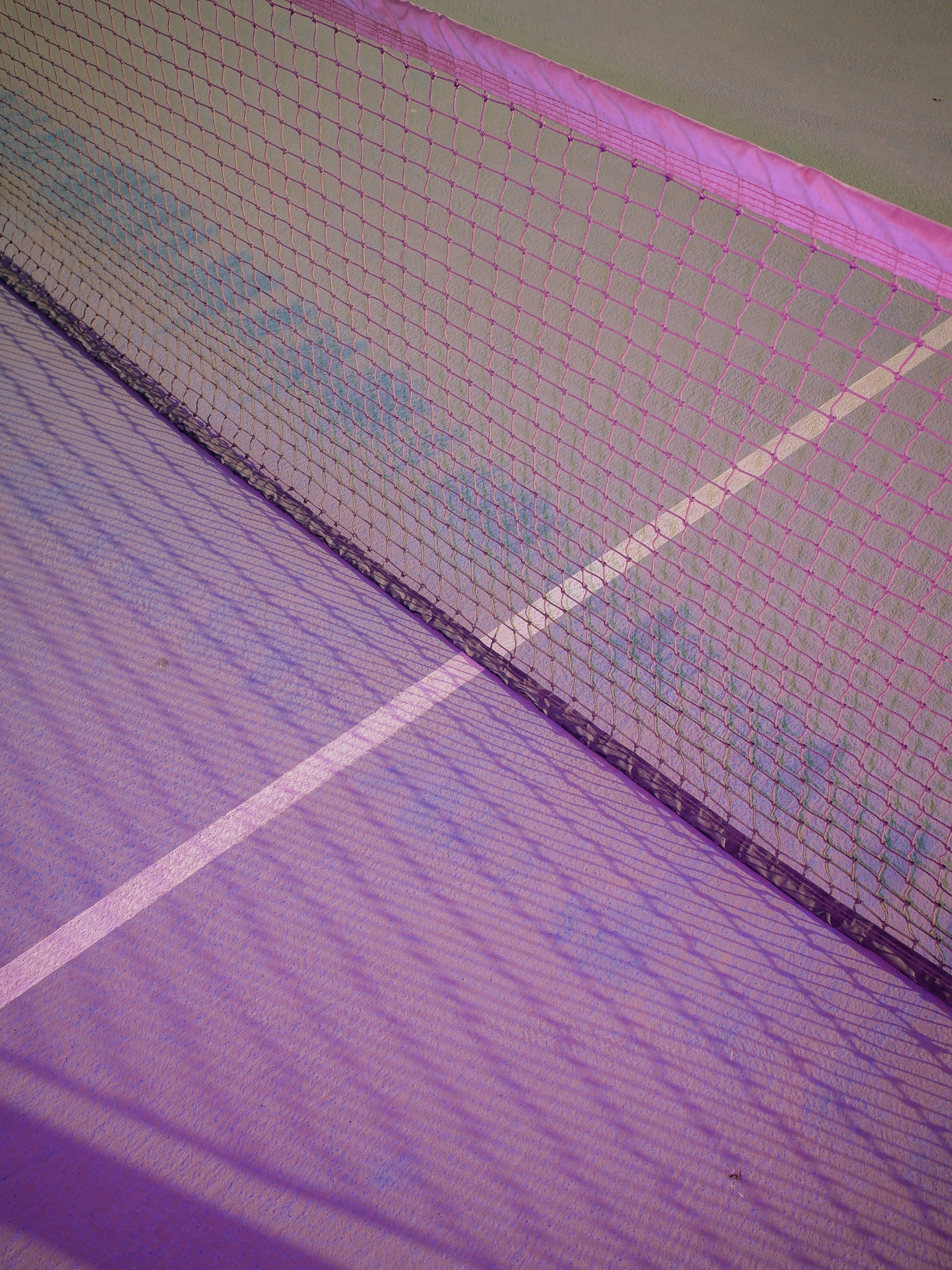 purple and white striped textile