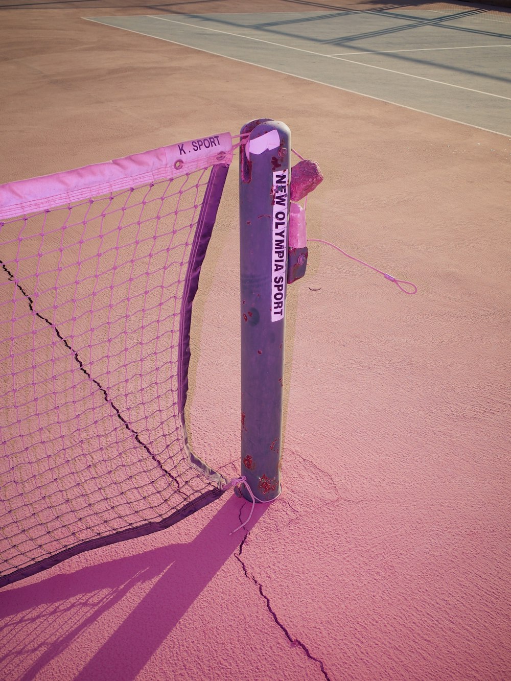 pink and white net on pink wall