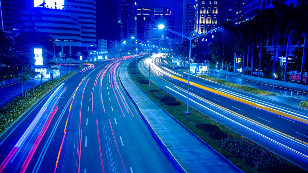 time lapse photography of cars on road during night time