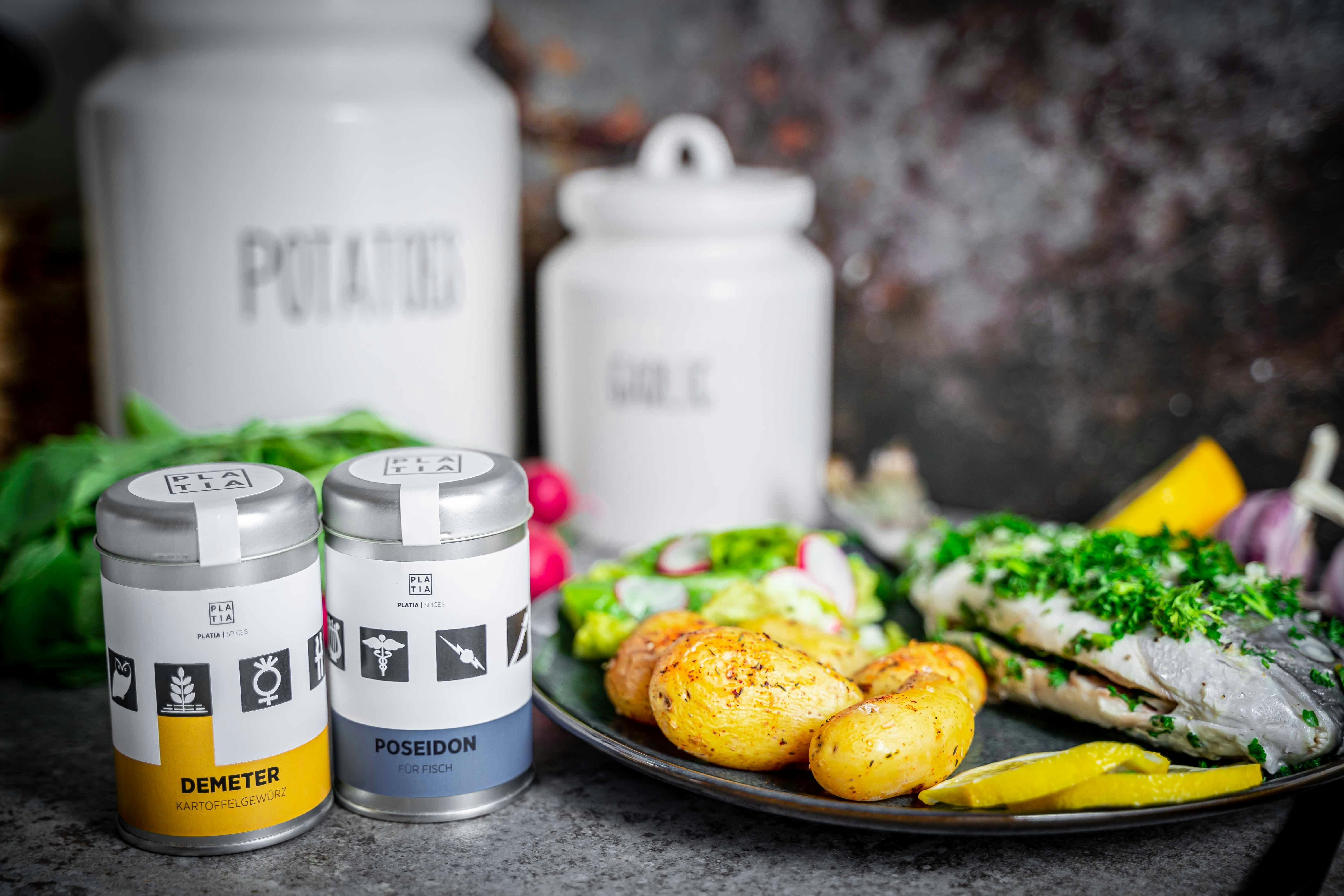 two white and blue labeled cans