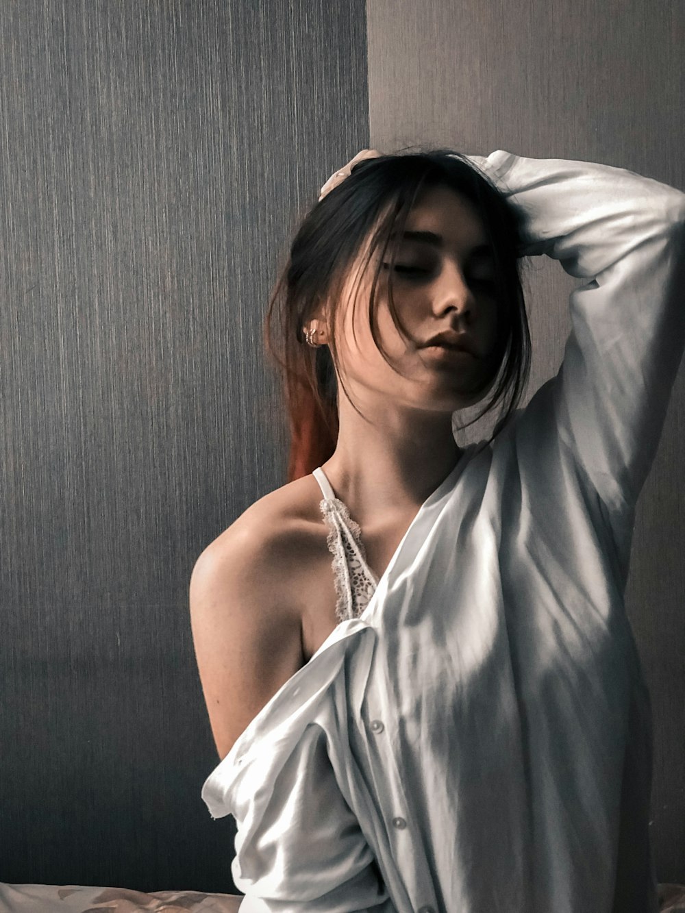 woman in white dress wearing silver necklace