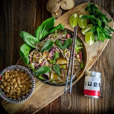 brown peanuts on brown wooden bowl