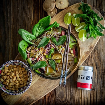 brown peanuts on brown wooden bowl