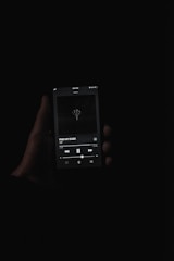 Artist uploading a new song using a sleek, dark-themed interface.