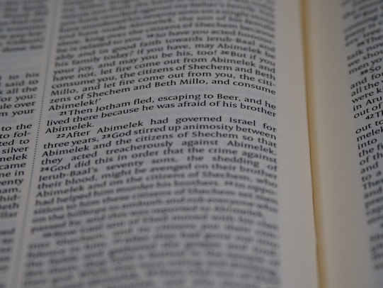 Text from a book page featuring paragraphs of narrative or dialogue related to characters such as Jotham and Abimelek. The focus is on storytelling elements and biblical references.