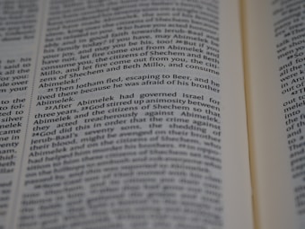 Text from a book page featuring paragraphs of narrative or dialogue related to characters such as Jotham and Abimelek. The focus is on storytelling elements and biblical references.