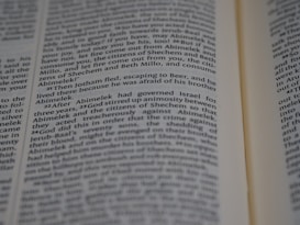 Text from a book page featuring paragraphs of narrative or dialogue related to characters such as Jotham and Abimelek. The focus is on storytelling elements and biblical references.