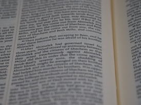 Text from a book page featuring paragraphs of narrative or dialogue related to characters such as Jotham and Abimelek. The focus is on storytelling elements and biblical references.