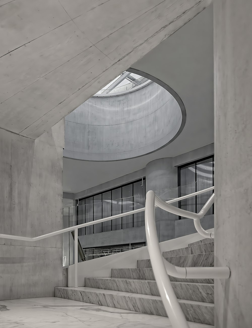 white staircase near blue and white concrete building