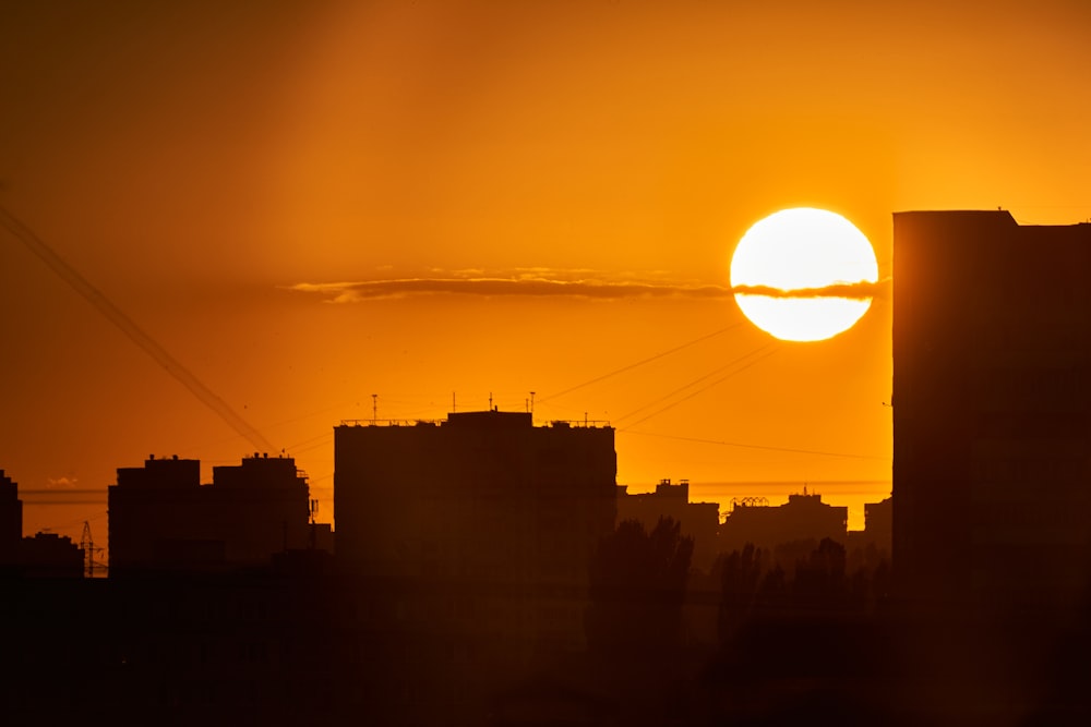 silhouette of buildings during sunset