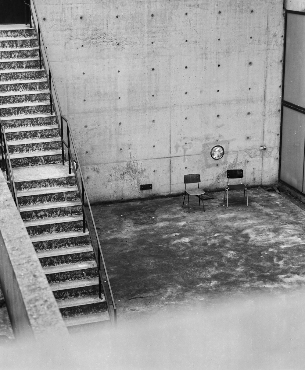 grayscale photo of concrete staircase