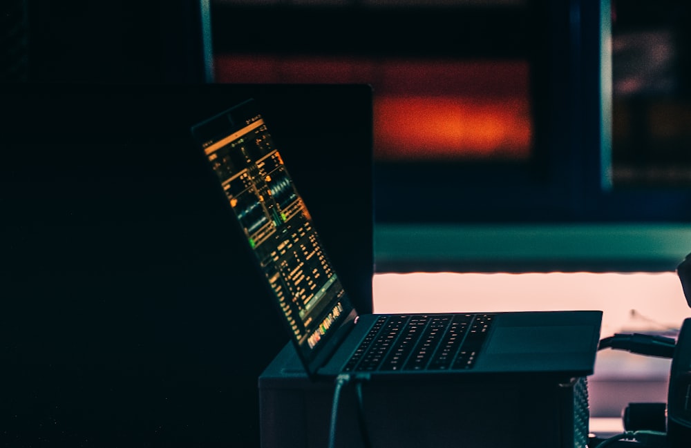 macbook pro on white table