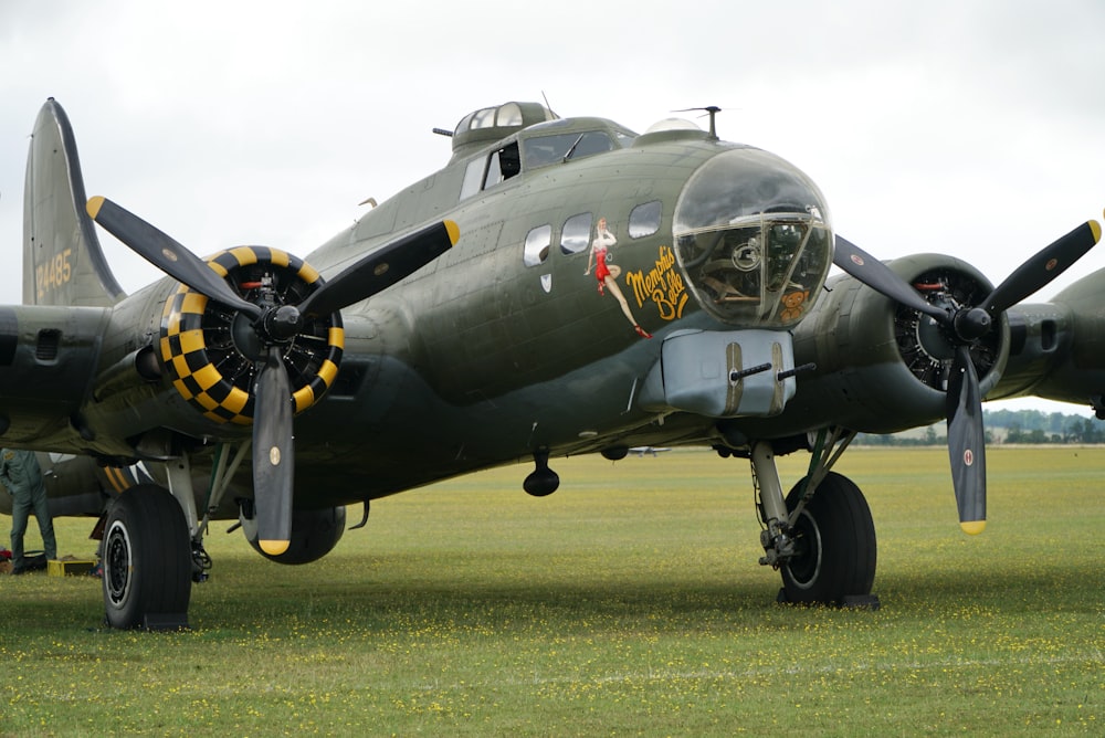 black and yellow fighter jet on green grass field during daytime