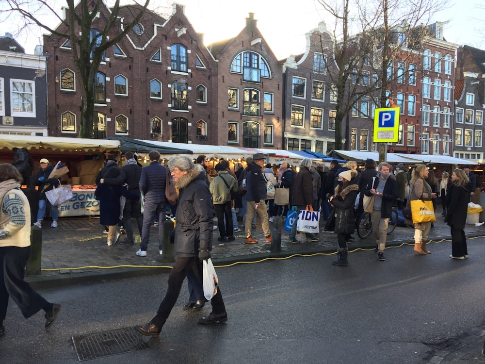 people walking on street during daytime