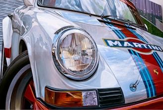 blue and white car in close up photography